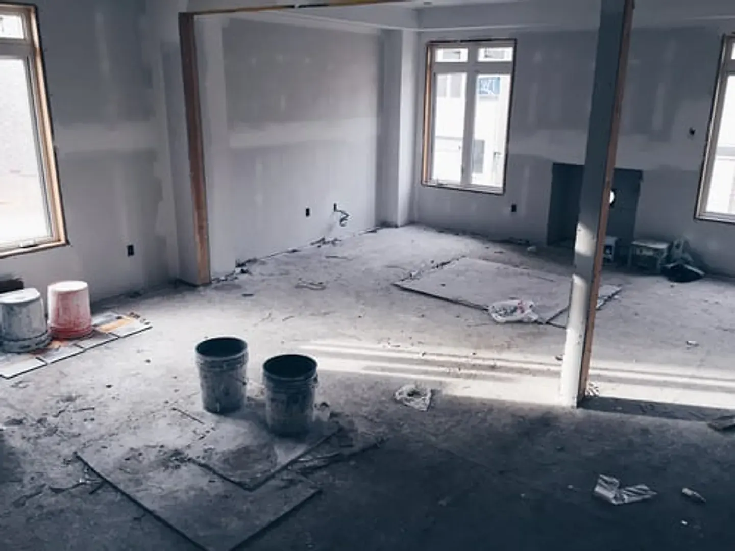 Interior space after construction with drywall dust on surfaces