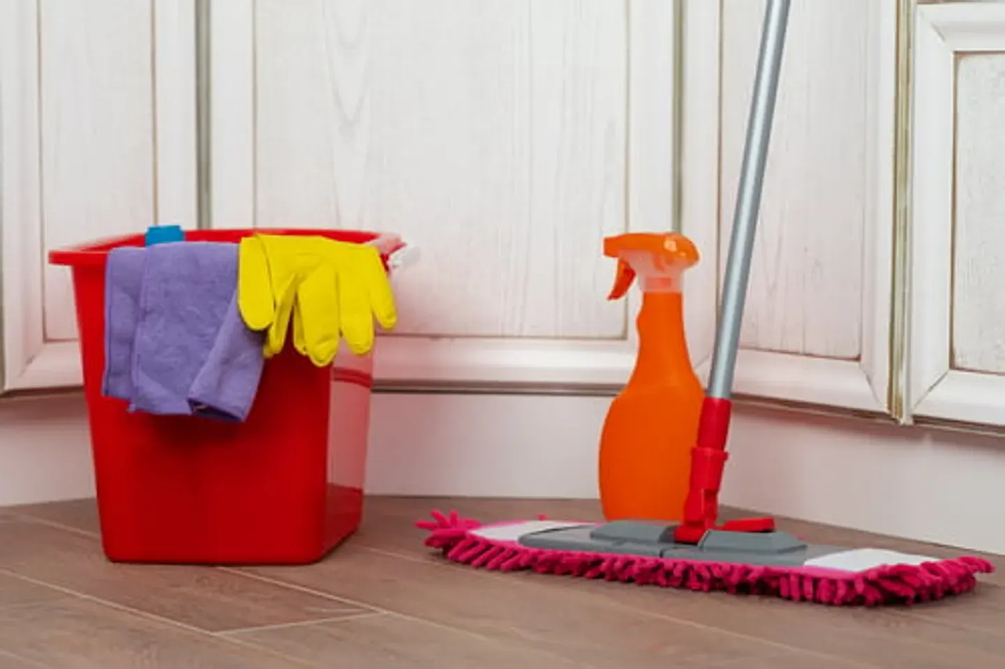 Deep cleaning supplies and mop prepared for a whole-home clean