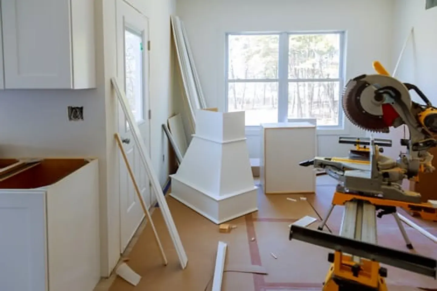 MP Remodeling crew workspace with tools and materials during a home renovation