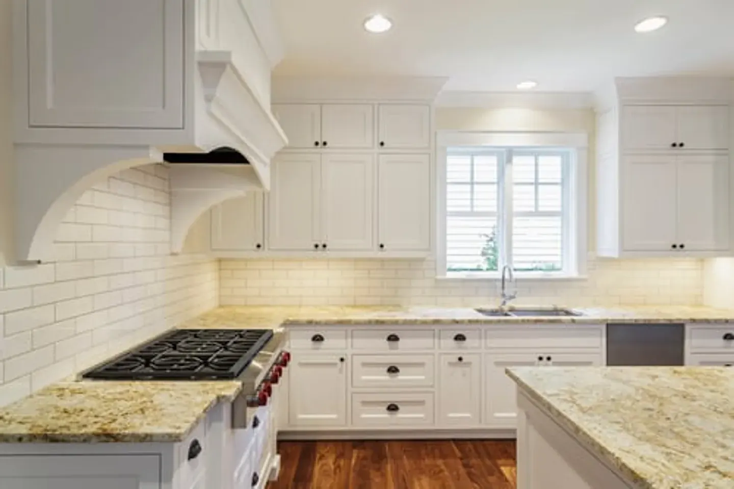 Newly remodeled kitchen with custom cabinetry and stone countertops in a Northern Virginia home