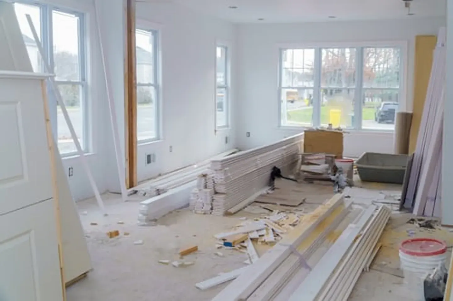 Interior room with construction debris ready for post-construction cleaning